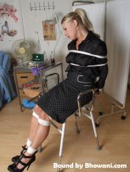 Photo of Abigail Toyne in bondage.