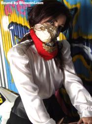 Photo of Amy in bondage.