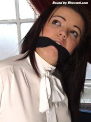 Photo of Amy in bondage.