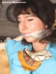Photo of Kiki H in bondage.