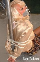 Photo of Lana Cox in bondage.