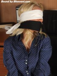 Photo of Lana Cox in bondage.