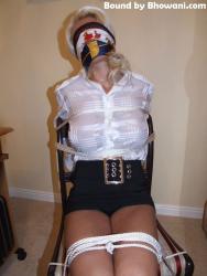 Photo of Lana Cox in bondage.