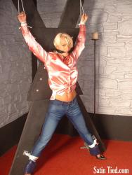 Photo of Lana Cox in bondage.