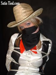 Photo of Lucy Zara in bondage.