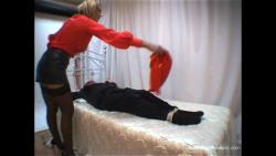 Photo of Lucy Zara in bondage.