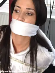 Photo of Olivia in bondage.