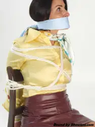 Photo of Sarah Wild in bondage.