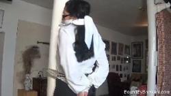 Photo of Tia in bondage.