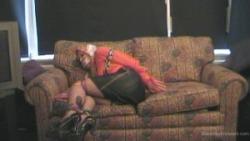 Photo of Abigail Toyne in bondage.