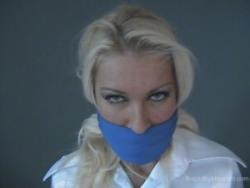 Photo of Lana Cox in bondage.